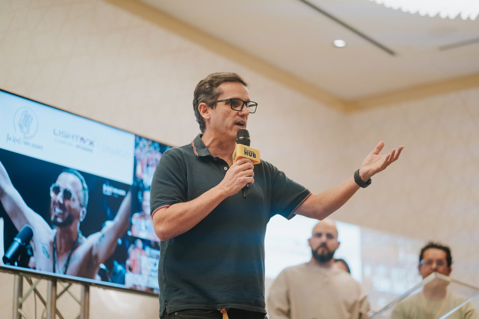 A speaker presenting at the conference